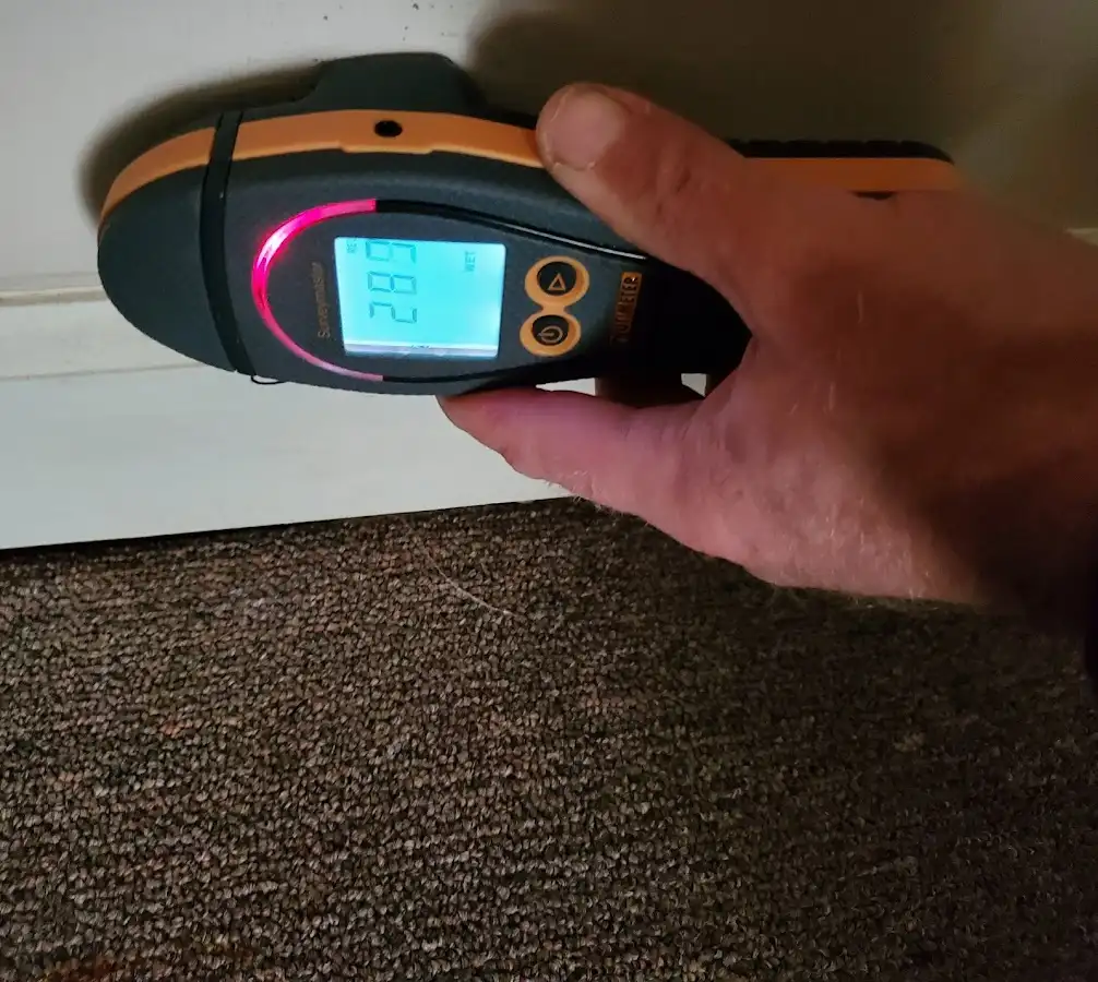 Moisture detection at baseboard during Burst Pipe Cleanup in Carson City